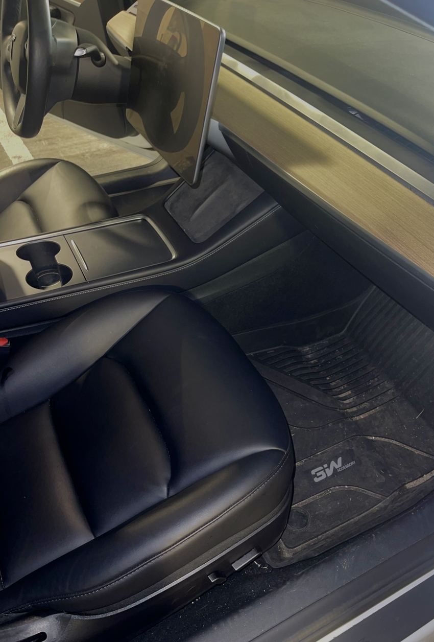 Tesla Model 3 passenger floor before detailing